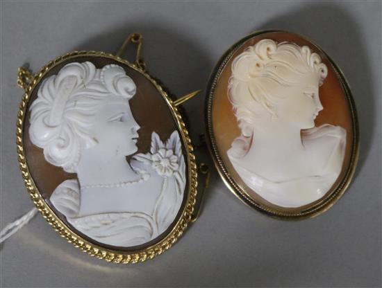 A Victorian style 9ct gold framed carved cameo portrait brooch and a similar gilt metal cameo brooch.